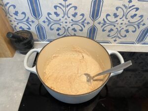 Mixing the homemade play-dough ingredients in a pot